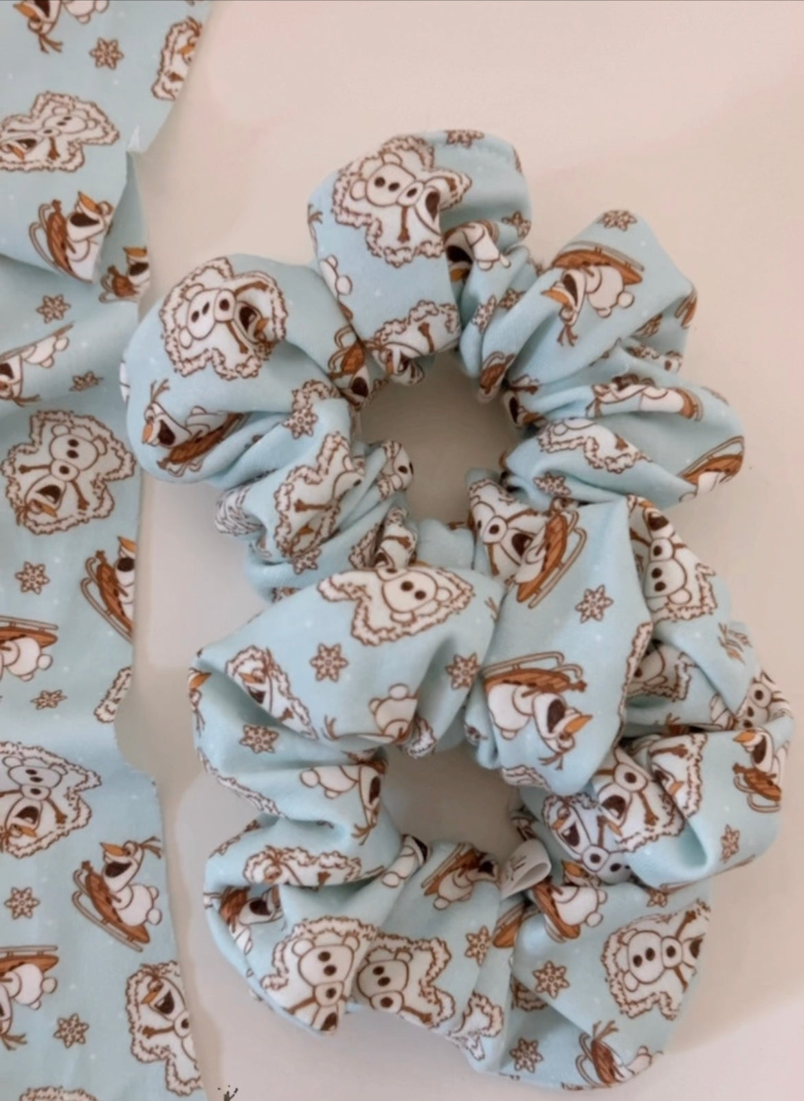 everyone's favourite snow man blue holiday hair scrunchie